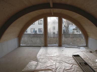 Maison contemporaine en bois - toiture plein cintre en finition